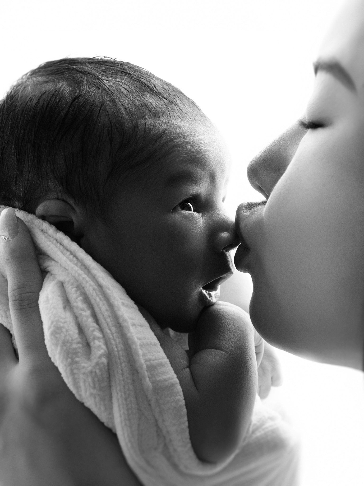 Mother and newborn baby in black and white